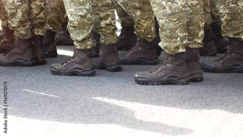 Soldiers in a formation. Modern army equipment. Shoes Soldiers in a formation. Modern army equipment. Shoes