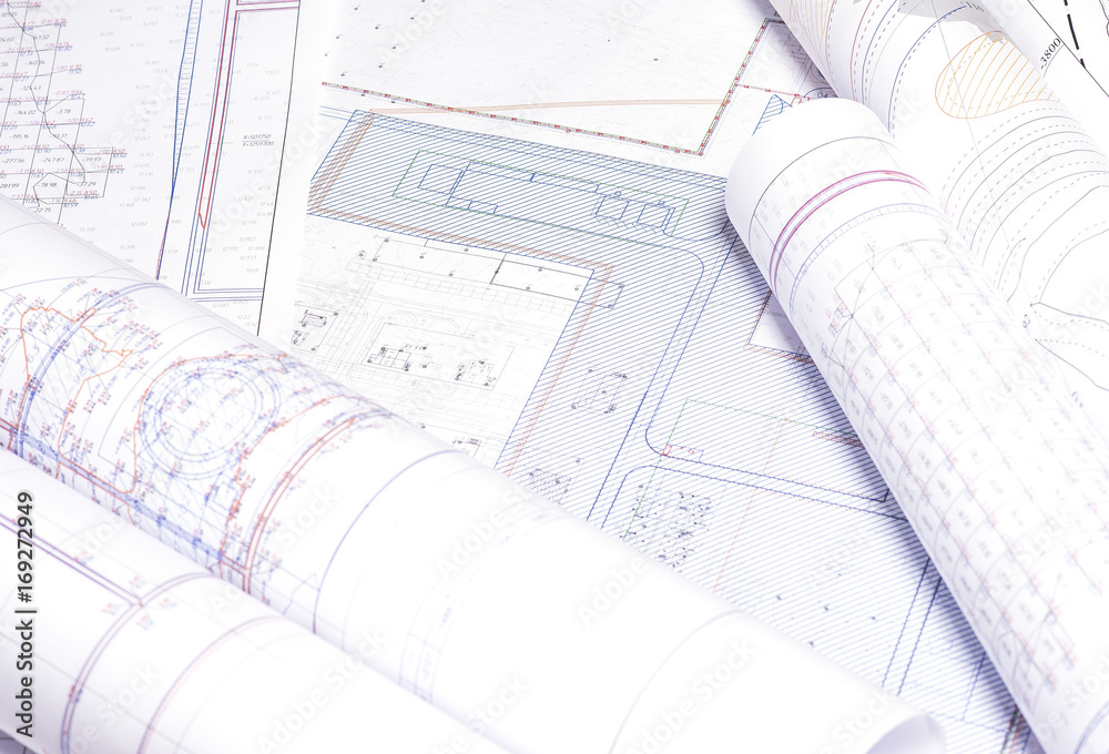 Project drawings for mining lie on the table Project drawings for mining lie on the table