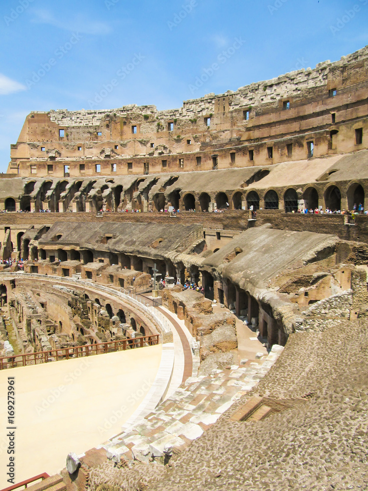 View of the inside of the Colosseum - crowd of unidentified tourists everywhere