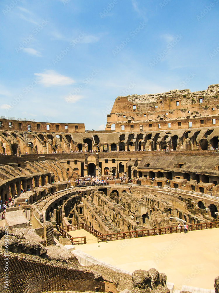 View of the inside of the Colosseum - crowd of unidentified tourists everywhere