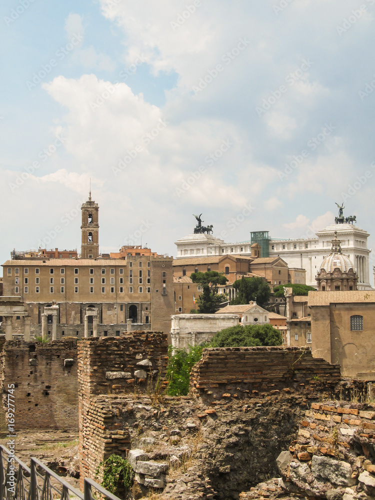 A view of Rome - ruins of the Roman Forum and the Altare della Patria (Altar of the Nation) in the background