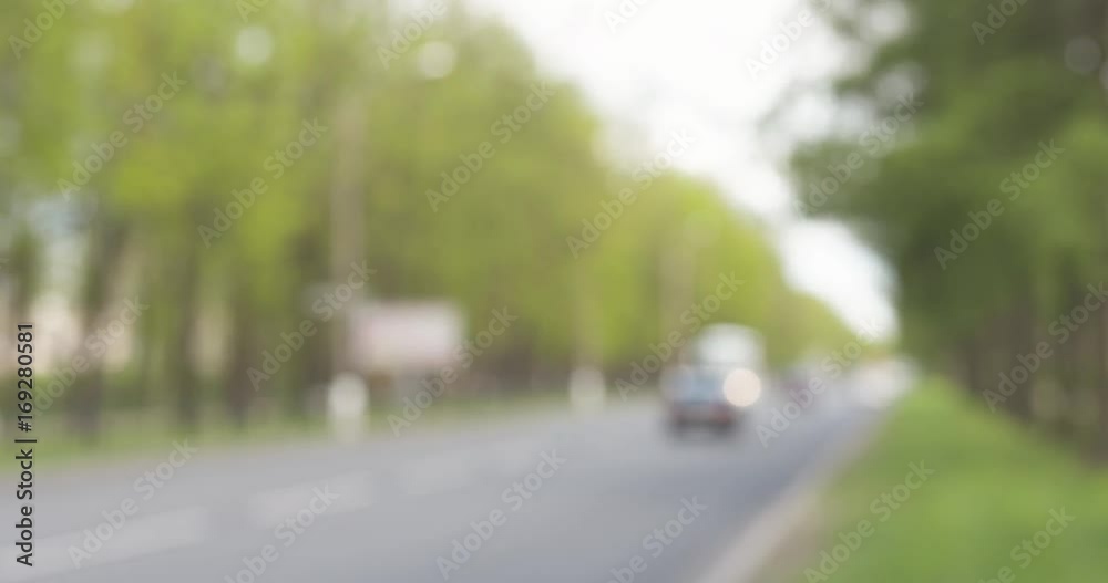 slow motion blurred background of boulevard in summer slow motion blurred background of boulevard in summer