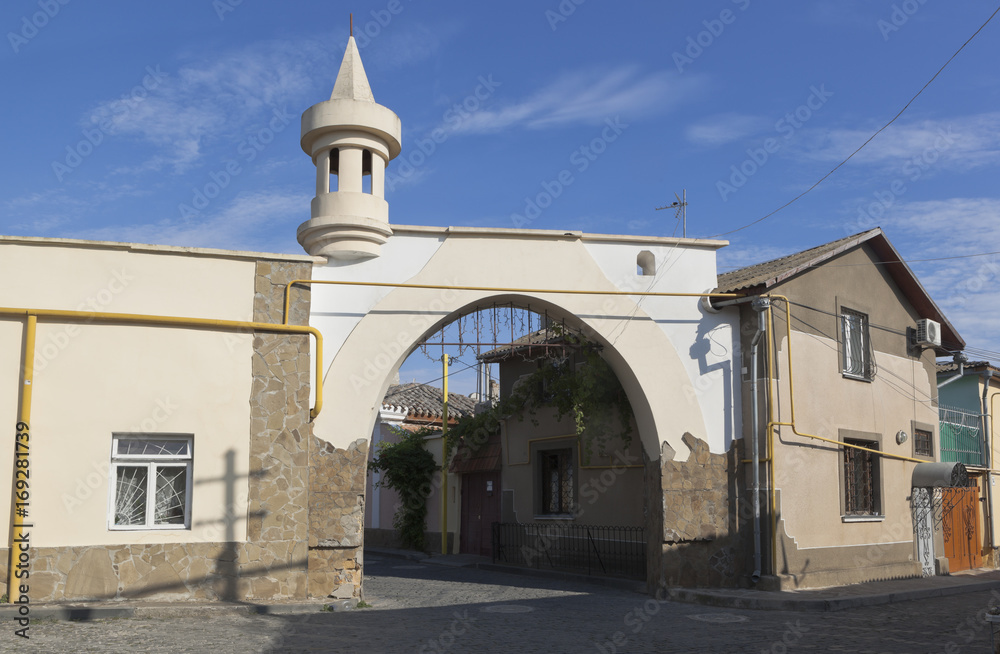 Gate at the crossroads of Karaite and School streets in the old city of Evpatoria, Republic of Crimea, Russia