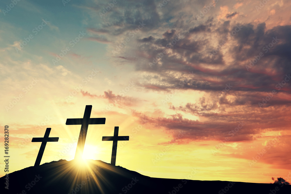 Religious cross silhouette against a bight sunrise sky. 3D Rendering - obrazy, fototapety, plakaty 