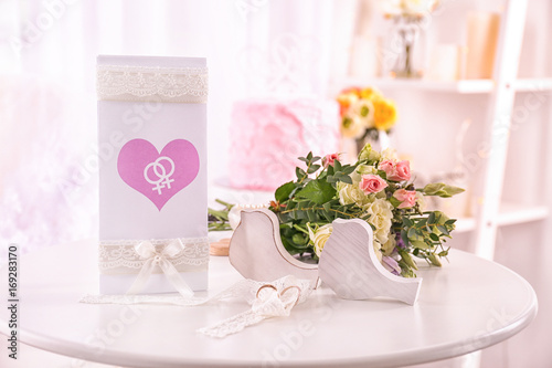 Lesbian wedding accessories on table