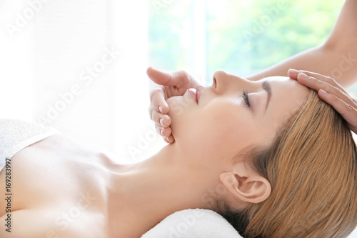 Young woman enjoying of fac...