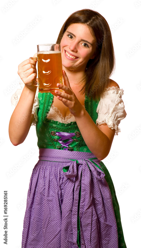 Attraktive junge Frau im Dirndl mit Bierkrug Attraktive junge Frau im Dirndl mit Bierkrug