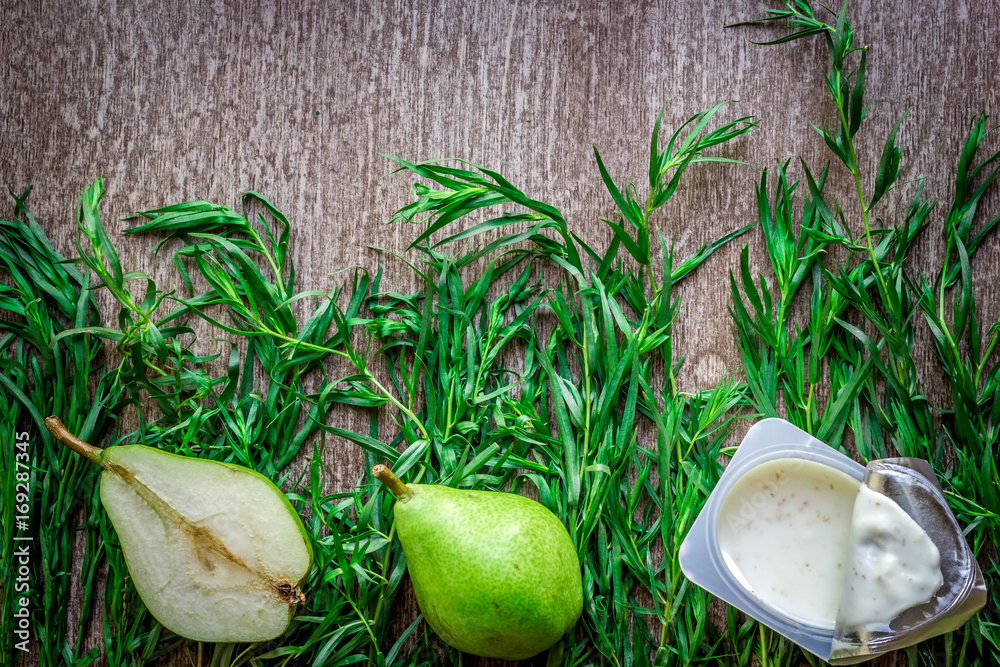 Fototapeta premium Healthy and delicious yogurt with green pear