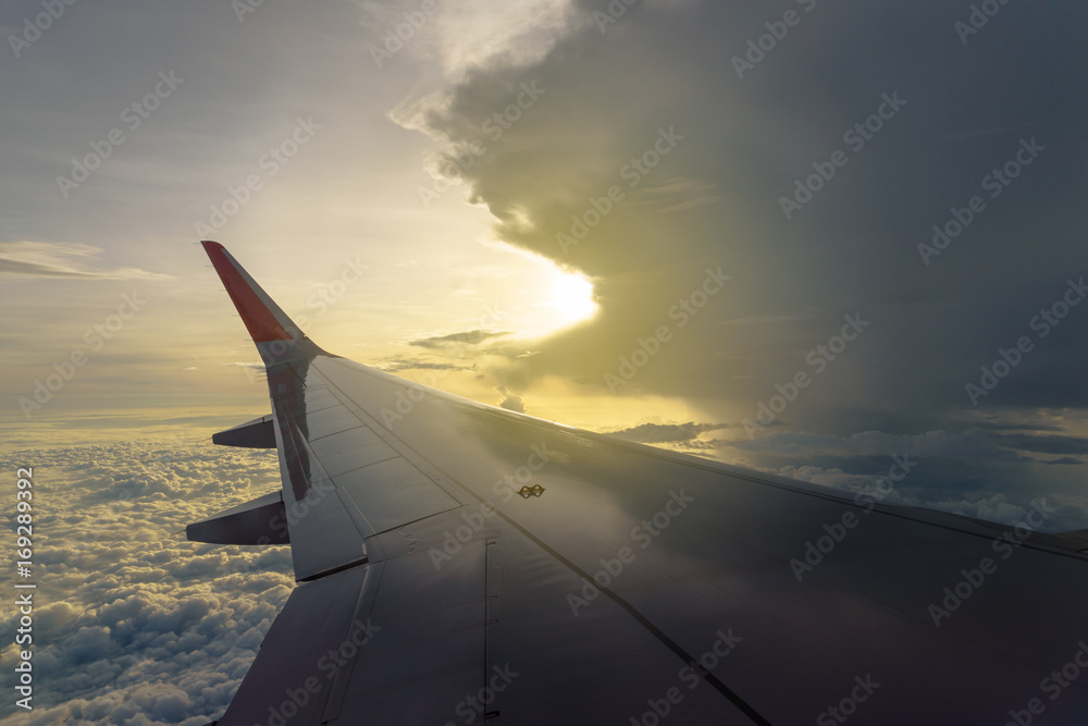 Morning sunrise with Wing of an airplane. Morning sunrise with Wing of an airplane.