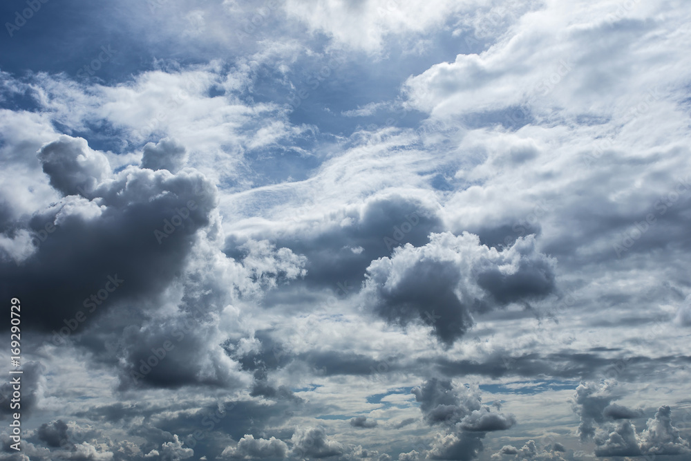 White fluffy clouds in the blue sky background