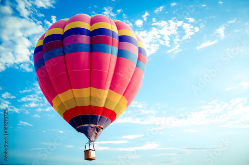 Fotografie, Obraz Colorful hot air balloon flying on sky