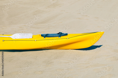 Boat kayak on the sand
