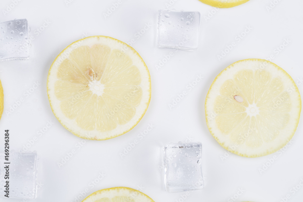 Ice cubes and lemon slices with white background. Ice cubes and lemon slices with white background.