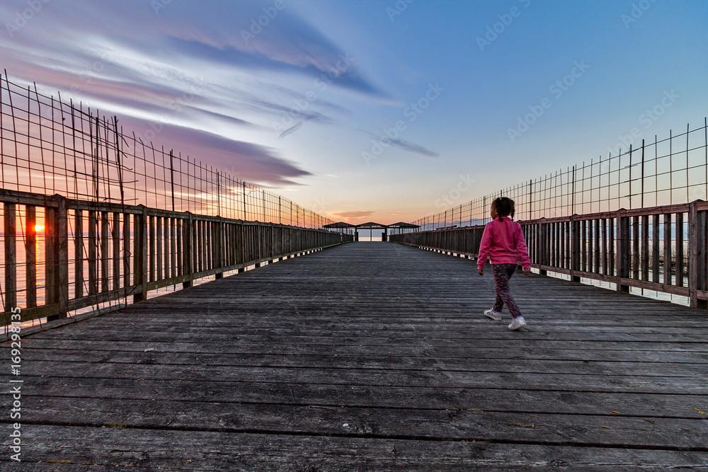 la bambina sul ponte Stock Photo | Adobe Stock
