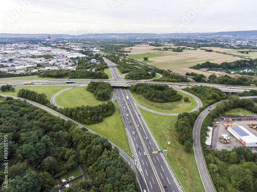 Aerial view of a highway intersection with a clover-leaf interchange Germany Koblenz photo