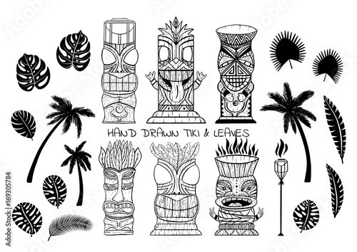 Wood Polynesian Tiki idols, gods statue carving, torch, palm trees, tropical leaves.