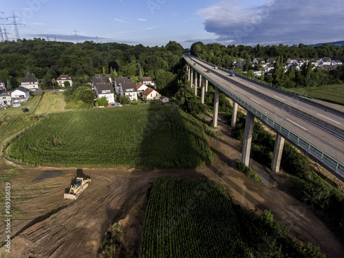 concrete road - street highway bridges Nature Landscape village and contruction site photo