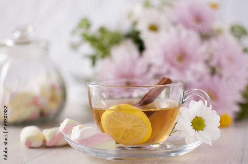 Tea with lemon and cinnamon. Tea with lemon and cinnamon.