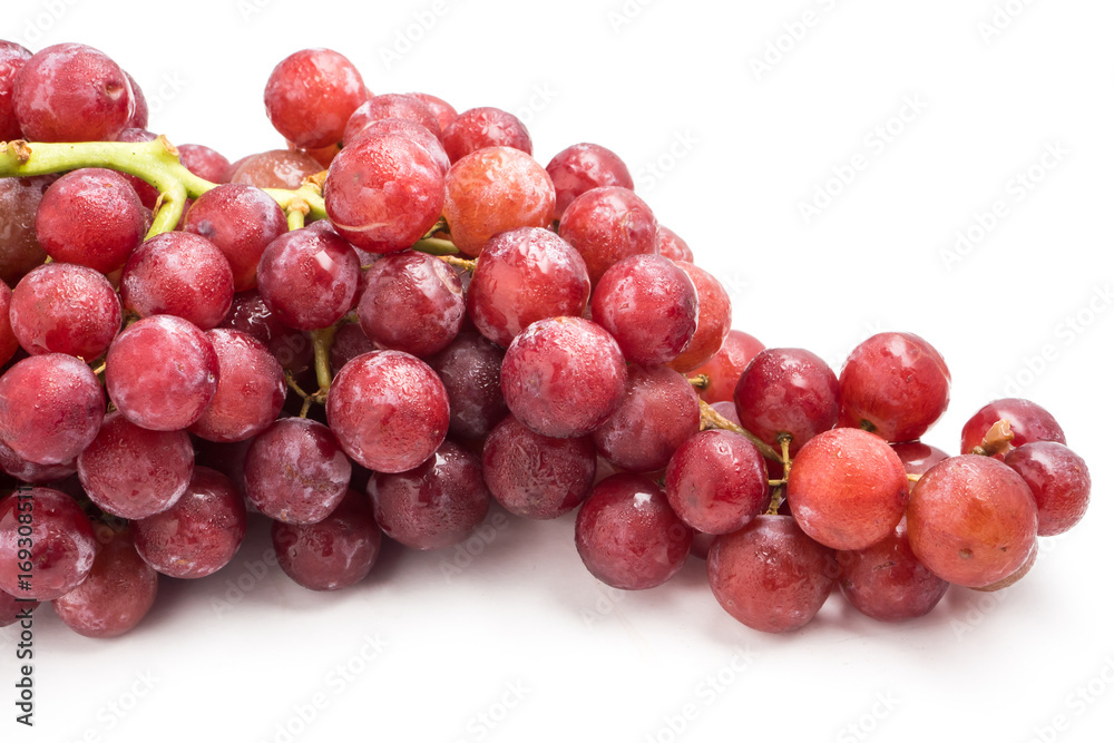 Red grapes on a white background.