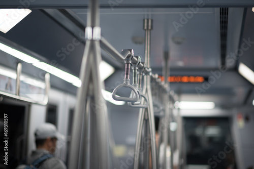 Handles for standing passenger inside a train