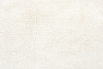 Knitted material background. Shawl texture fabric, top view.