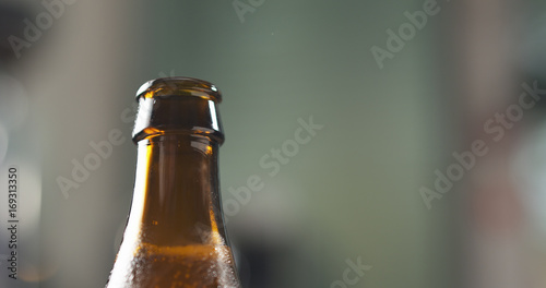 open brown beer bottle closeup