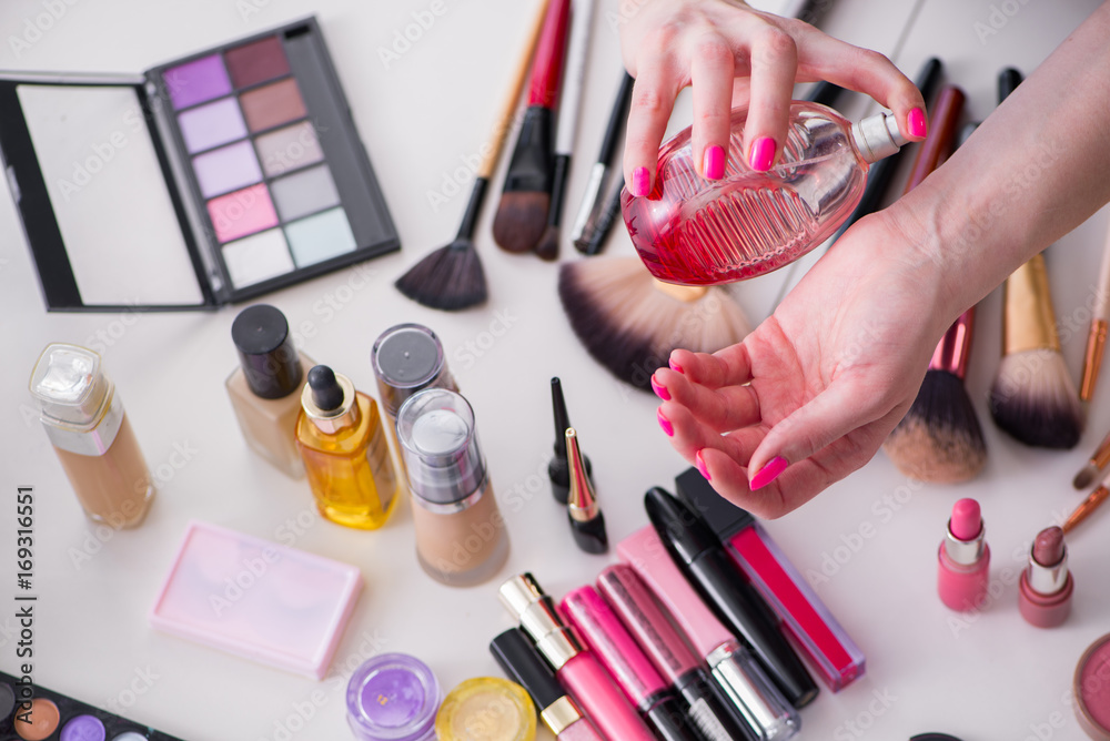 Collection of make up products displayed on the table Collection of make up products displayed on the table