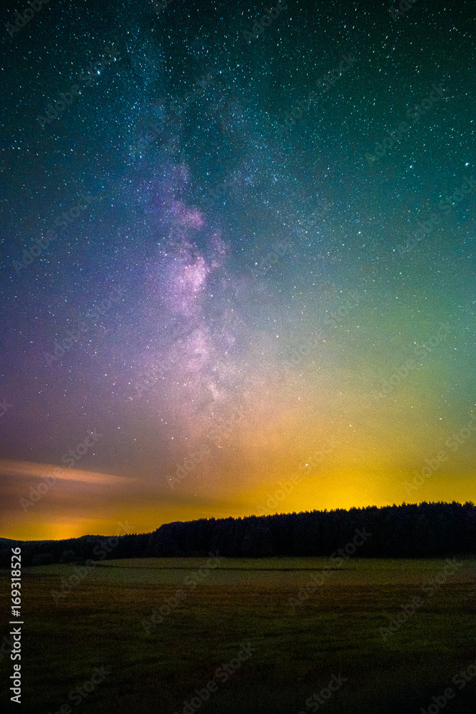 Light pollution and the Milky Way as seen from the Odenwald near Bullau in Germany. Light pollution and the Milky Way as seen from the Odenwald near Bullau in Germany.