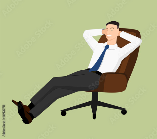 Businessman sitting behind the table and relaxing