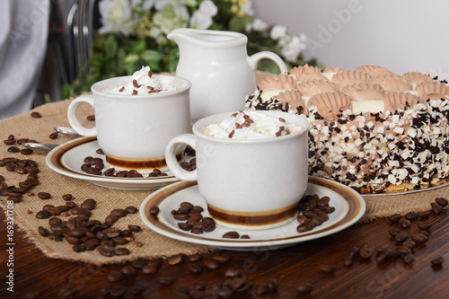 coffee with whipped cream and chocolate and coffee with cream cake