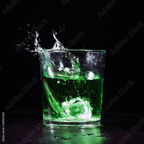 Green cocktail with splash