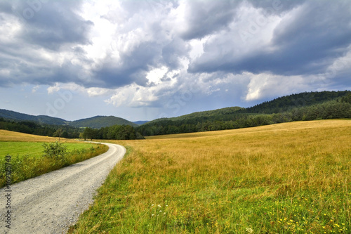 View of Beskid Niski from Hutnianska pass, Poland with dramatic sky