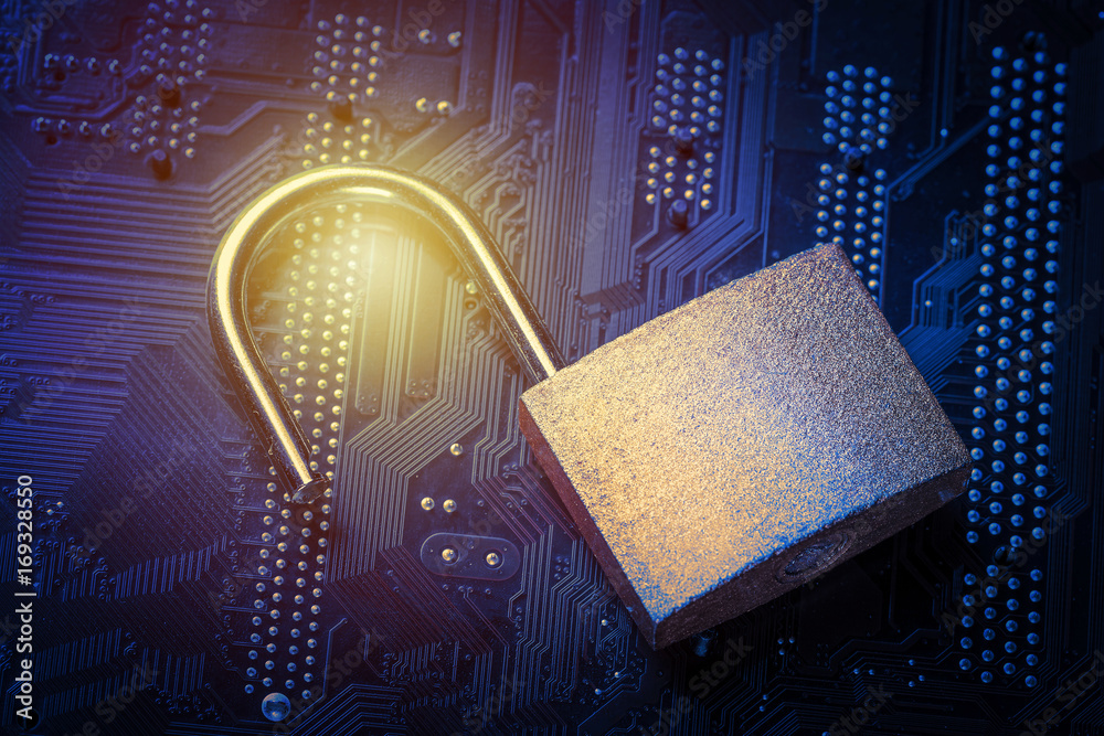 Fototapeta premium Opened padlock on computer motherboard. Internet data privacy information security concept. Blue toned image