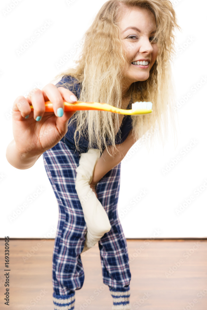 Happy woman brushing her teeth Happy woman brushing her teeth