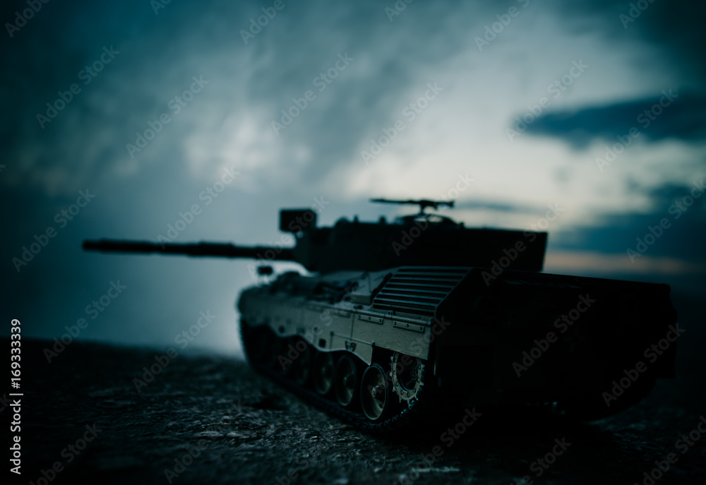War Concept. Military silhouettes fighting scene on war fog sky background, World War German Tanks Silhouettes Below Cloudy Skyline At night. Attack scene. Armored vehicles. Tanks battle scene War Concept. Military silhouettes fighting scene on war fog sky background, World War German Tanks Silhouettes Below Cloudy Skyline At night. Attack scene. Armored vehicles. Tanks battle scene