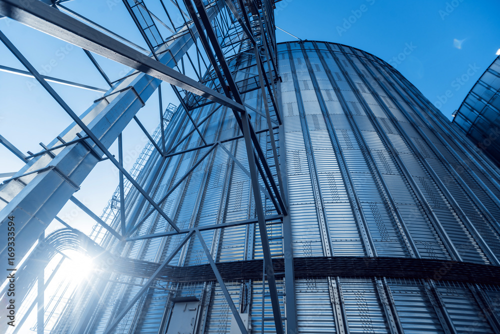 Modern silos for storing grain harvest. Agriculture. Modern silos for storing grain harvest. Agriculture.