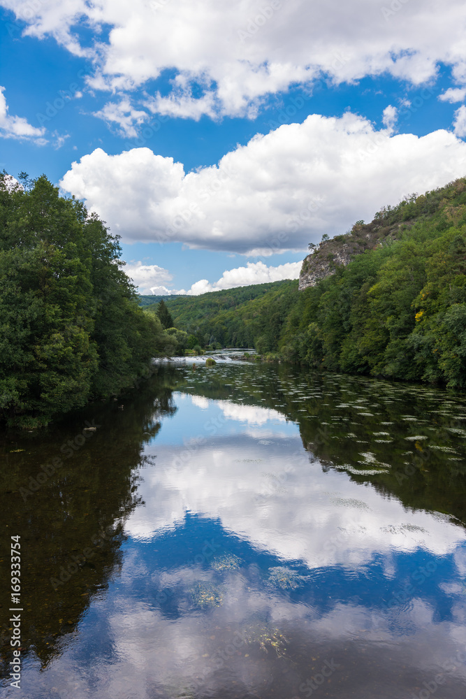 Landscape with reflection of water, clouds, forest, trees Landscape with reflection of water, clouds, forest, trees