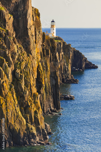 Neist Point Lighthouse on the isle of Skye in Scotland, UK photo