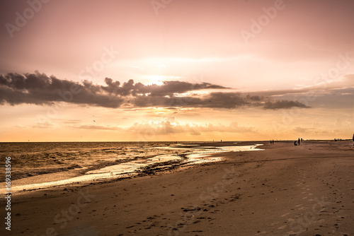 Sunset Walking down the beach 