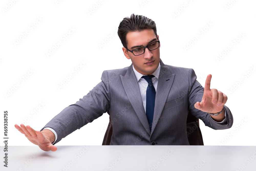 Young businessman pressing virtual buttons isolated on white bac Young businessman pressing virtual buttons isolated on white bac