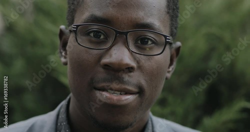 Closeup portrait of young african postgraduate student in classical suit