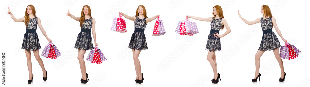 Woman with shopping bags isolated on white