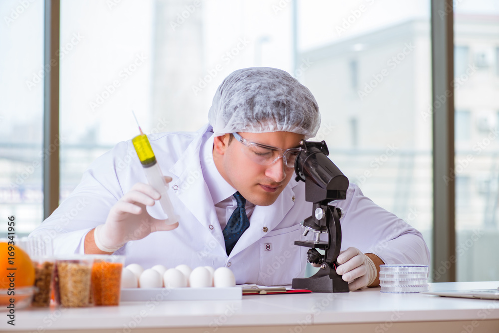 Nutrition expert testing food products in lab Nutrition expert testing food products in lab