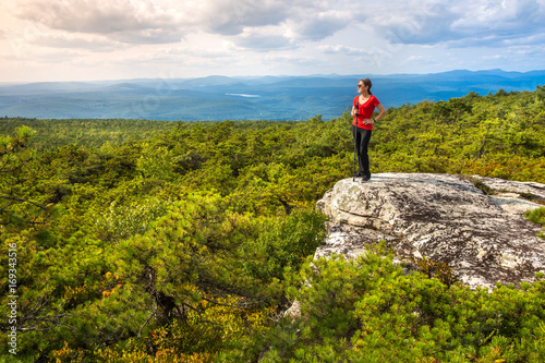 Fényképezés Woman enjoys the nature at High Point, on top of Shawangunk Ridge, in Upstate New York