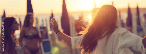 teenager having fun on the beach, banner.Abstract blurry picture