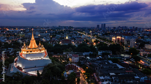  'Golden Mountain '  Wat Saket Ratcha Wora Maha Wihan popular Bangkok tourist attraction , Landmarks of bangkok Thailand .  top view © meen_na