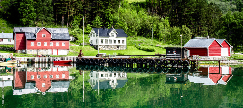 White house reflection on Fjord