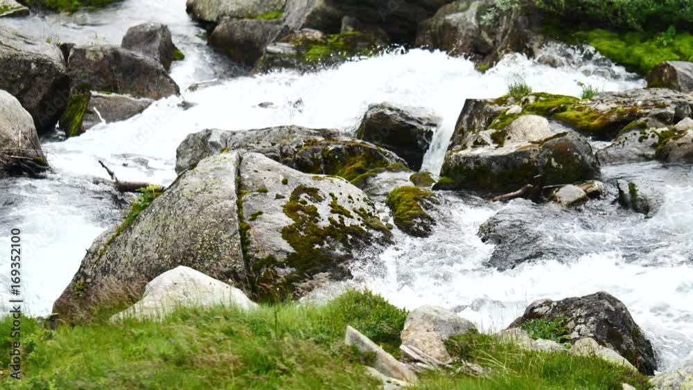 Waterfall in mountains of Norway in rainy weather. Waterfall in mountains of Norway in rainy weather.