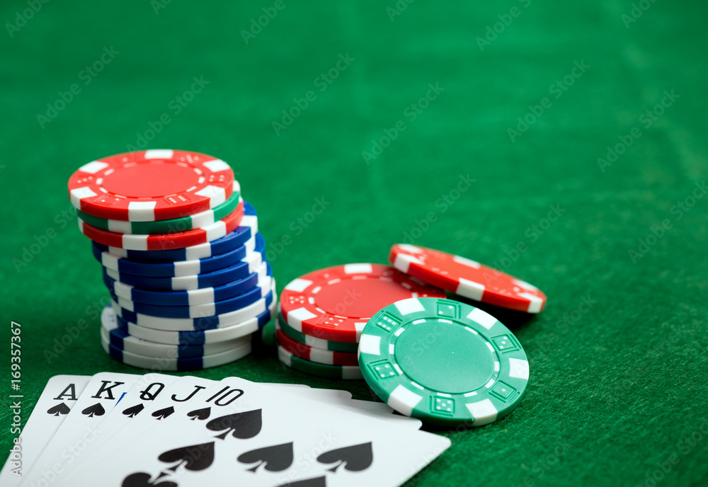 Casino green table with chips and play cards Casino green table with chips and play cards