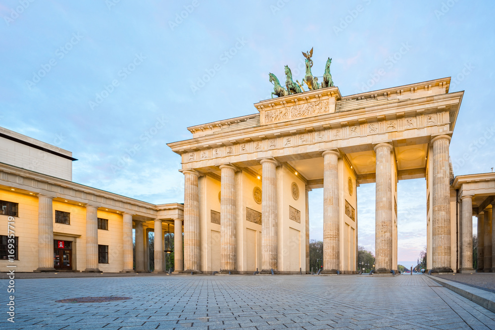 Fototapeta premium Brandenburg gate with sunrise Berlin city, Germany